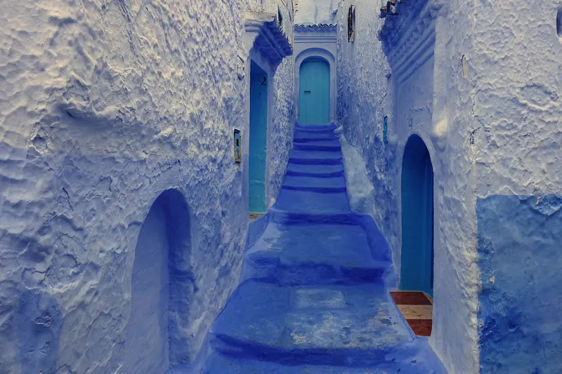 An alley and blue houses in Chefchaouen
